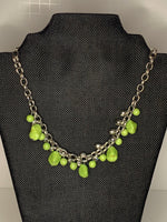 Bexley Green and silver stones make up this short silver necklace