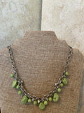 Bexley Green and silver stones make up this short silver necklace