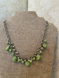 Bexley Green and silver stones make up this short silver necklace